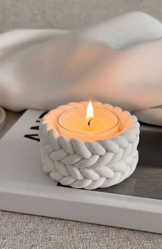 
Elevate your home with our handcrafted tea light holder, beautifully detailed with a timeless knot design. Expertly made with love and precision, this decorative candle holder creates a soft, ambient glow, bringing warmth, serenity, and a cozy atmosphere to any room. Amor Scent Co